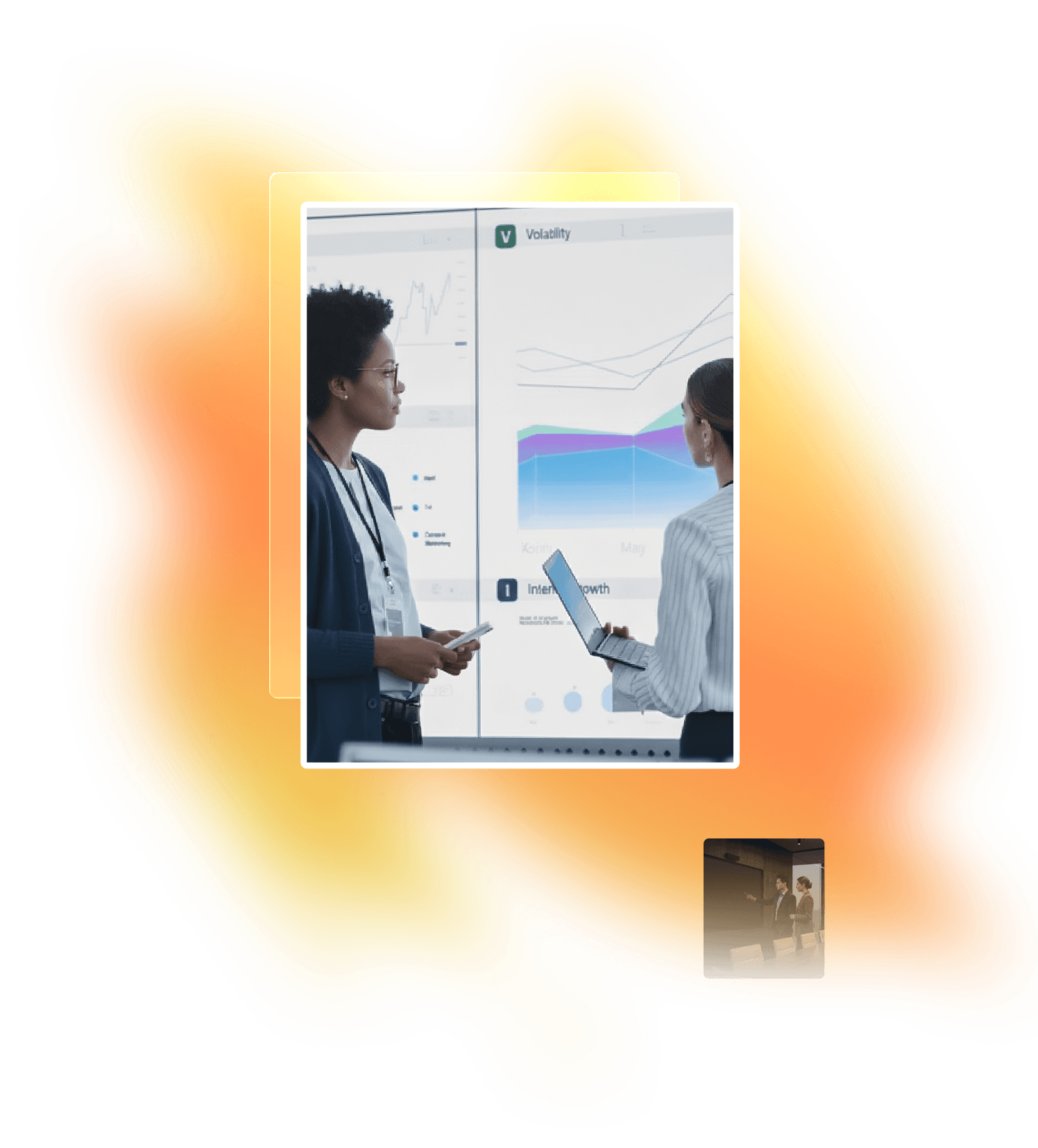 a meeting room with people working on a big screen